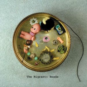 THE MIGRANT cover THE MIGRANT cover